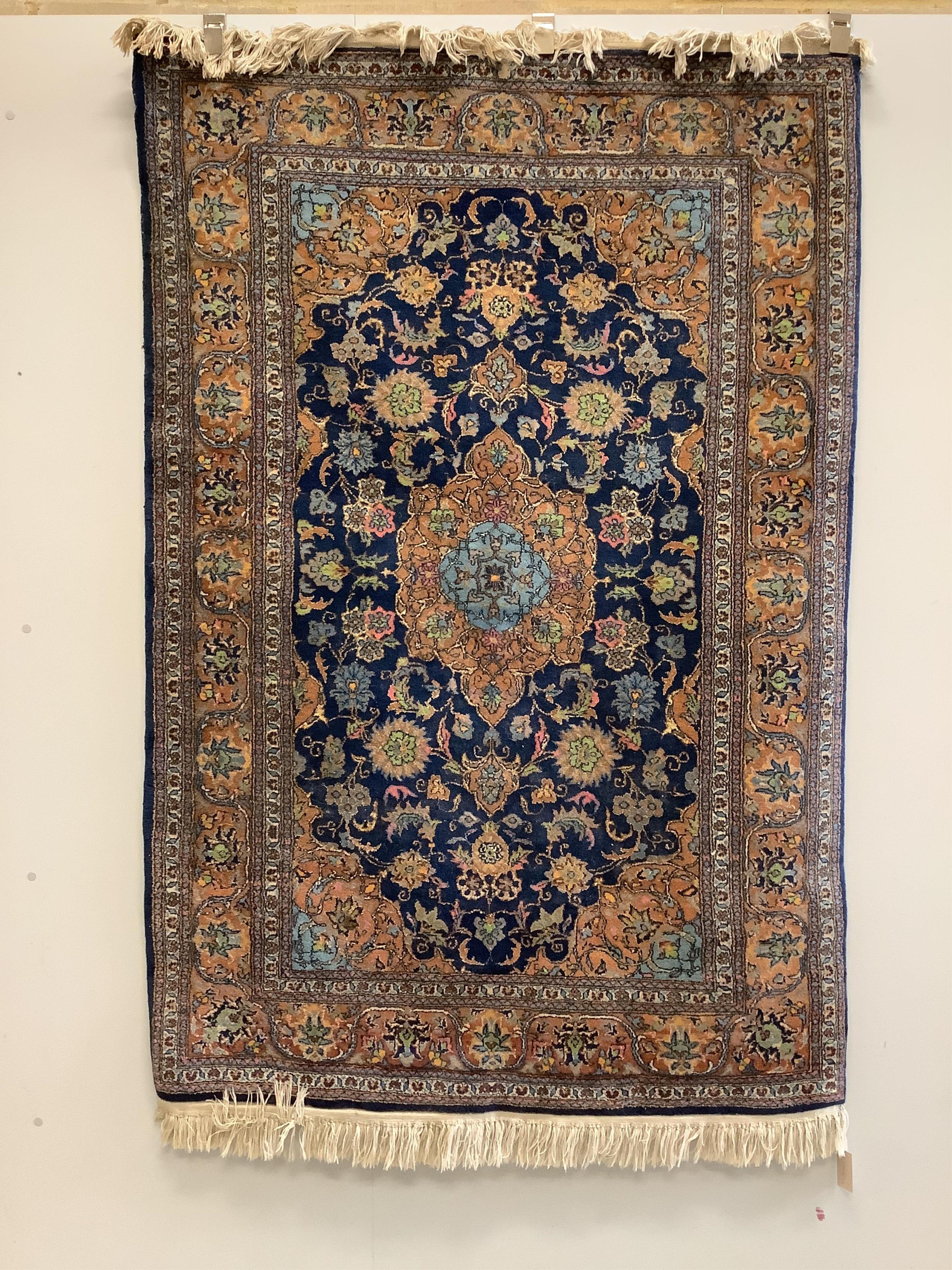 A North West Persian blue ground rug, 184 x 125cm. Condition - fair